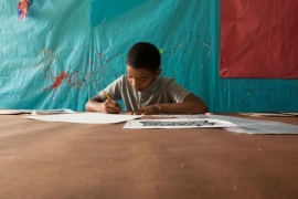 CCSA student working at a table